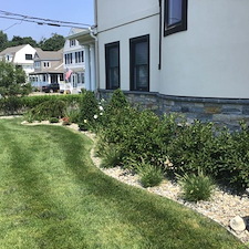 Beach-Inspired-Landscape-Design-with-River-Rock-in-Milford 1